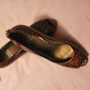 Snakeskin peephole pumps